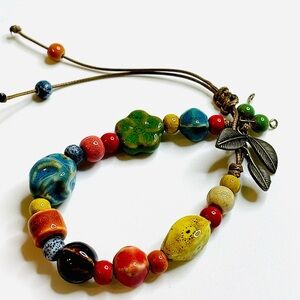 Green Flower Bracelet ceramic beaded Blue Red Yellow Cord Adjustable